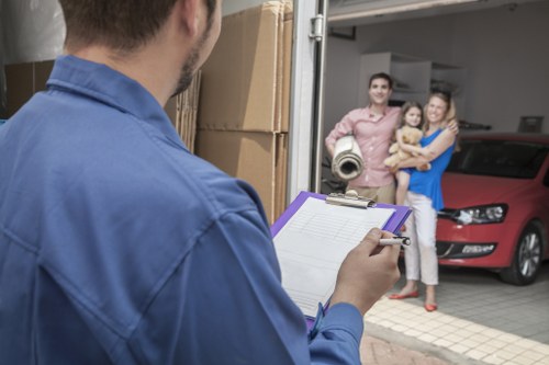 Fragile items and household boxes being prepared for a Barnes move