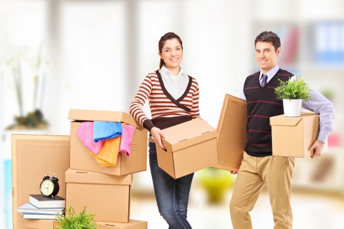 Careful wrapping and loading of household furniture for a Barnes move