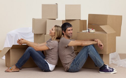A removals team planning access and parking for a Barnes property move