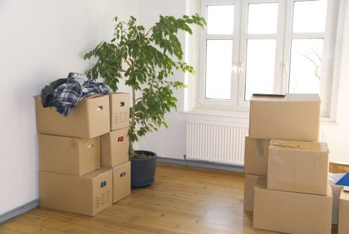 Packed office furniture and equipment ready for a Barnes commercial move