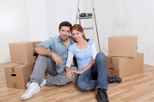 Professional movers loading household items for a Barnes relocation