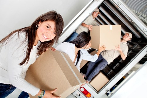 Careful loading of office items during a Barnes move