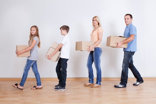 Careful furniture loading for a flat move in Barnes