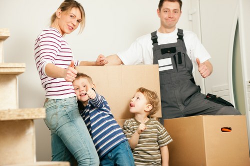 Packed boxes and furniture ready for a house move in Barnes